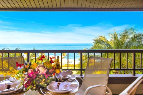 Outdoor meals feel extra special on your shaded balcony with elevated ocean and garden views. KRV-2421