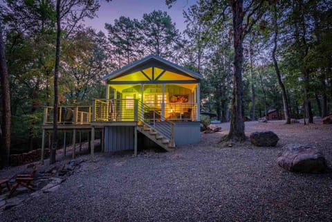 Twilight cabin exterior in the woods