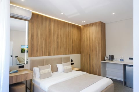 Deluxe Double Room, City View | In-room safe, desk, laptop workspace, blackout drapes