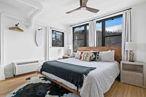 Each Deluxe King Suite in the historic Furman Building is uniquely designed, with slightly varying layouts and bed orientations. Every suite features one king bed, boutique styling, and thoughtful comforts — décor and configuration may differ slightl