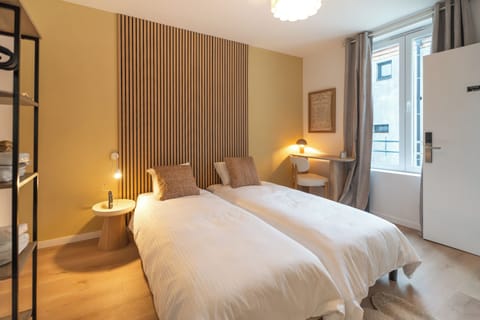 Classic Twin Room, Courtyard View | Laptop workspace, blackout drapes, iron/ironing board, free WiFi