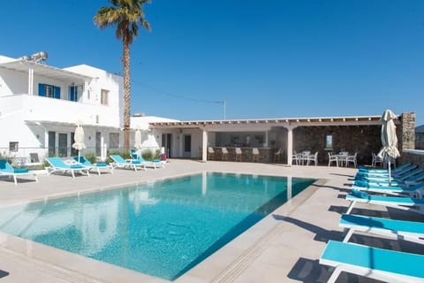 Standard Quadruple Room, Balcony, Garden View | Pool | Seasonal outdoor pool