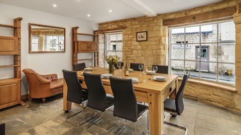 With views from the historic shop windows across the charming Cotswold stone streets of Painswick, this room is the entertainment hub of the house.