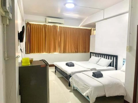 Triple Room, City View | Minibar (some free items), blackout drapes, WiFi (free)