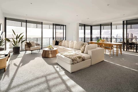 Open-plan living, wraparound views, floor-to-ceiling glass. Warning: you may never want to leave the sofa.