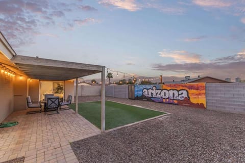 Spacious private backyard with outdoor seating.