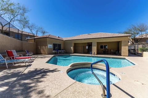 Shared community amenities including a pool, spa, fitness center, and clubhouse for guest enjoyment.