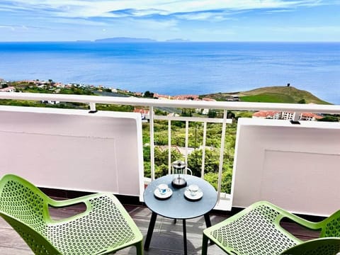 Jezebel’s View Balcony: Enjoy breathtaking views of the Atlantic, the Desertas Islands, and the iconic Atalaia Rock. This clean, private outdoor space features stylish green seating and a table, perfect for coffee while watching the horizon
