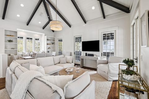 Spacious living room with vaulted ceilings and cozy seating