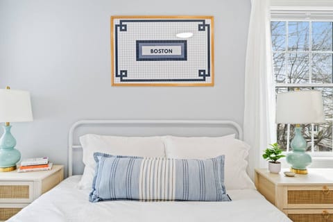Bright bedroom with some Boston touches