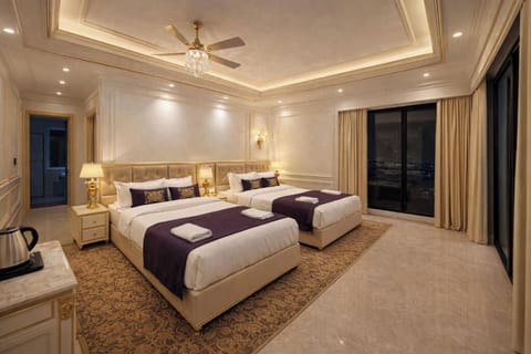 Premium bedding, desk, laptop workspace, soundproofing