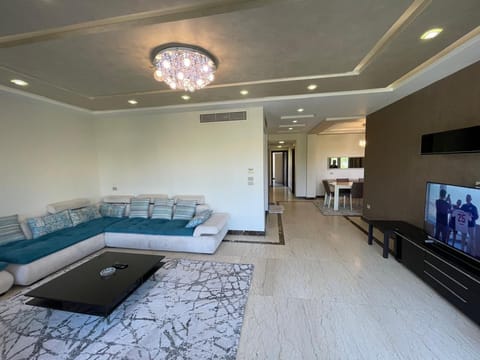 Deluxe Apartment, Private Bathroom, Garden View | Living area | Smart TV