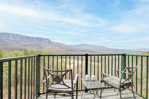 Sip your morning coffee on this private balcony while soaking in breathtaking mountain views that stretch endlessly across the horizon.