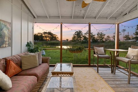 Peaceful screened-in porch—your front-row seat to stunning sunrise views