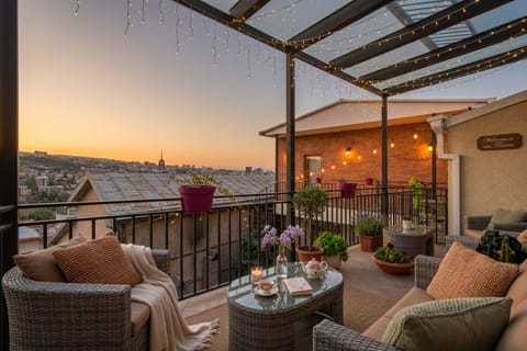Deluxe Double Room, Balcony, City View | Property grounds