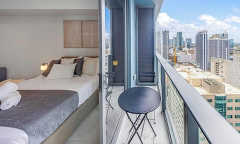 Studio, Balcony, City View | Premium bedding, down comforters, blackout drapes, iron/ironing board