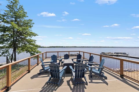 Enjoy a quiet evening around the firepit while taking in the stunning starlit sky, perfectly positioned above our private boat house for the ultimate relaxation.
