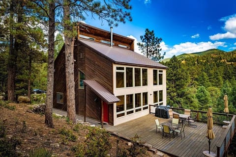 3 story home with large deck, beautiful views, sunroom with hot tub