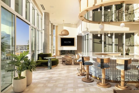 Our double-height lobby and lounge areas showcase the unique flair of Little Italy.