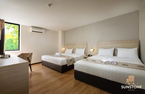 Family Triple Room, City View | Desk, laptop workspace, soundproofing, iron/ironing board