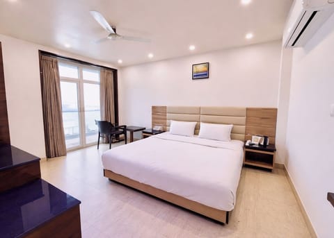 Premium bedding, desk, laptop workspace, soundproofing