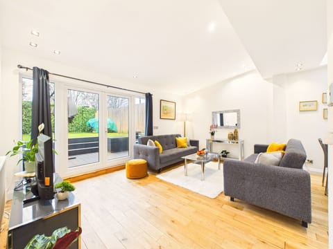 Comfort Apartment, Patio, Garden Area | Living area | 50-inch Smart TV with digital channels