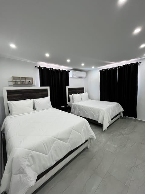 Deluxe Apartment, Ocean View | Iron/ironing board, free WiFi