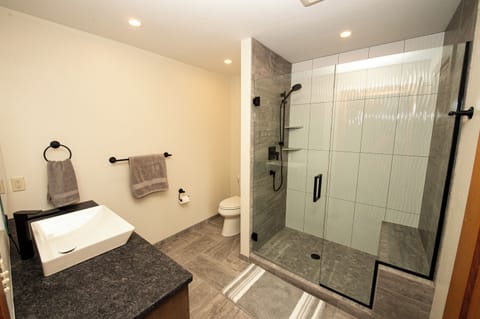 Primary Bathroom with tile walk in shower