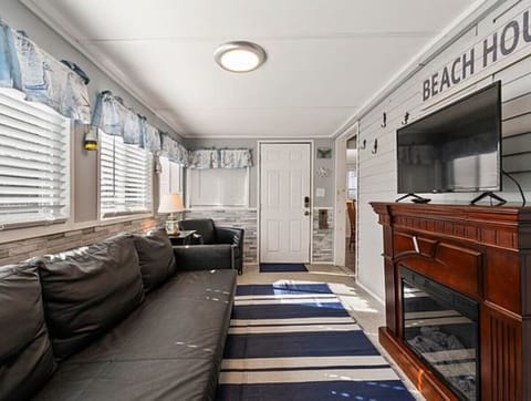 Living Room | Smart TV | Fireplace & Window Blinds