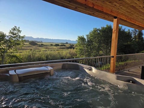 Hot tub with scenic mountain view