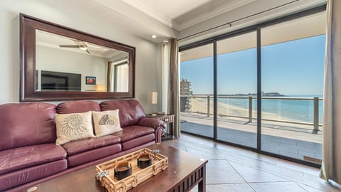 Step onto the balcony from the living room.