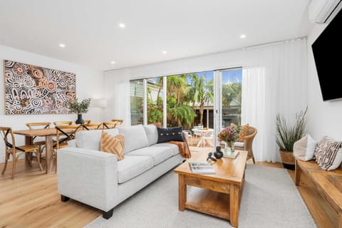 Stunning open living and dining with courtyard access