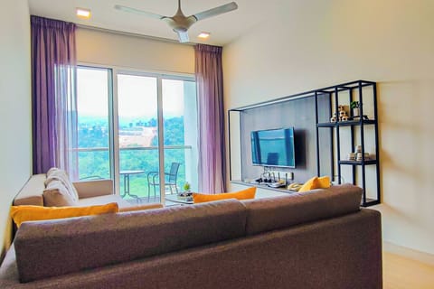 Deluxe Loft, Balcony, Mountain View | Living area | Flat-screen TV