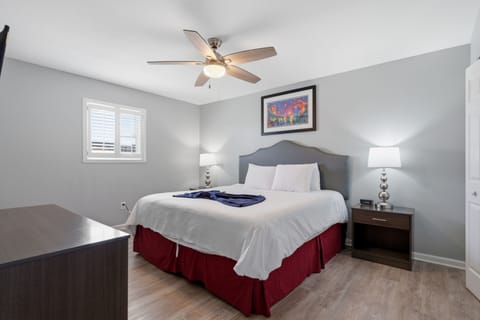 Serene primary bedroom with a king bed designed for restful nights