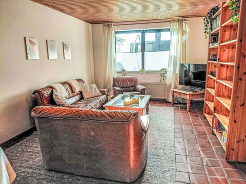 Furniture, Interior Design, Wall, Couch, Flooring, Wood, Floor, Ceiling, Living Room, Room