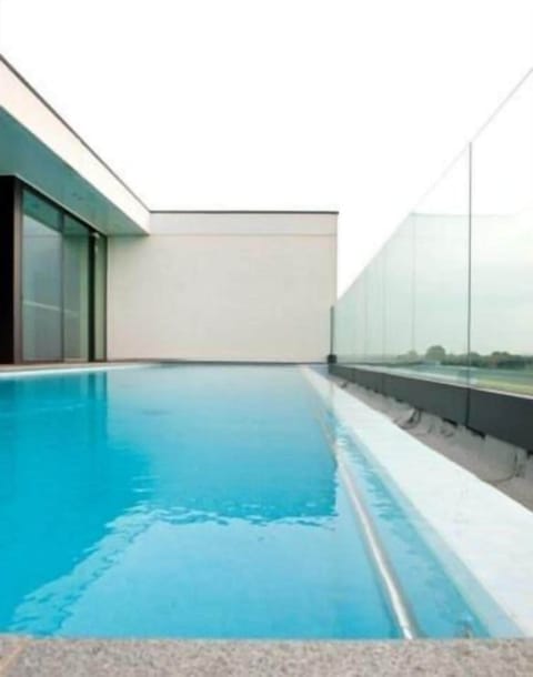 Seasonal outdoor pool, open 7:00 AM to 9:00 PM, sun loungers