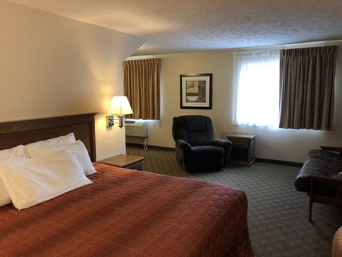 Standard Room, 1 King Bed, Non Smoking, Refrigerator & Microwave (Extended Stay) | Iron/ironing board, free WiFi, bed sheets