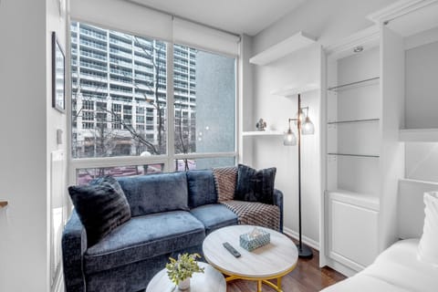 Comfort Studio Suite | Living area | 50-inch flat-screen TV with digital channels