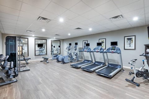 Break a sweat with state-of-the-art fitness equipment in a bright, inviting gym space.