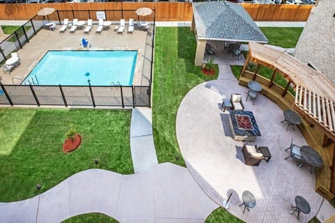 Dive into relaxation by the pool or enjoy a cozy evening by the fire pit.