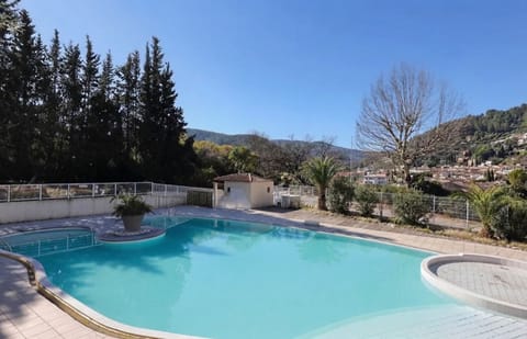 Take a dip in the inviting pool while enjoying the sun and greenery of the surrounding hills.