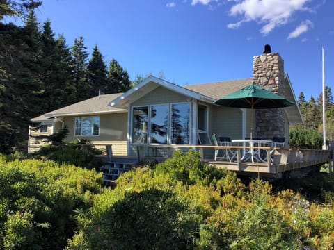 Our summer home is tucked into the natural landscape