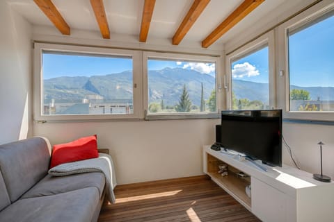 Family Apartment, Multiple Bedrooms, Lakeside (Torbole Lake Front) | Living area | Flat-screen TV