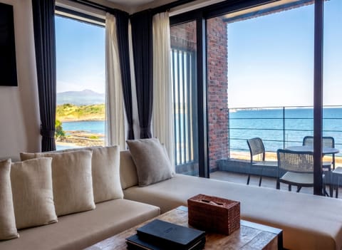 Twin Room, 2 Double Beds | Living area | Flat-screen TV