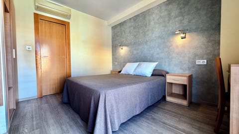 Double Room, Balcony, City View | Desk