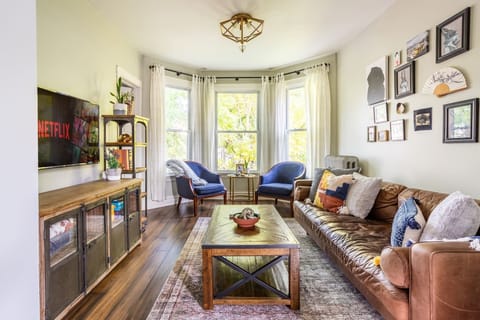 Enjoy our vibrant living room full of quirky decorations that gives off a welcoming atmosphere!