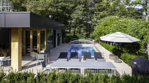 Poolside patio with chaise lounges for sun soaked relaxation