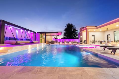 End the day with a peaceful swim beneath beautiful skies and glowing lights.