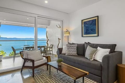 Living room with king-size sofa be