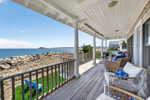 Welcome to The Tides at Third Cliff!  
Our Oceanfront porch with comfortable seating, perfect for relaxing while enjoying unobstructed views of the water and the soothing sound of the waves. 🌊☀️